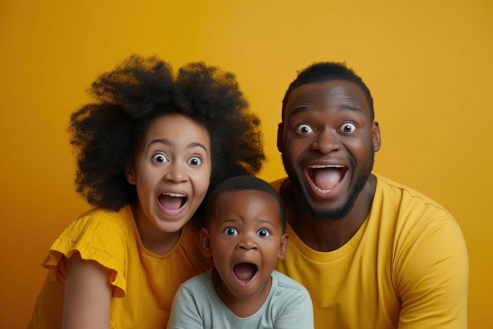 African American parent surprised portrait family.