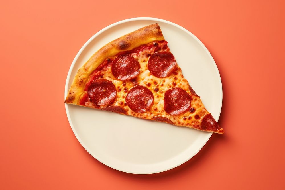 Pepperoni pizza plate food freshness.