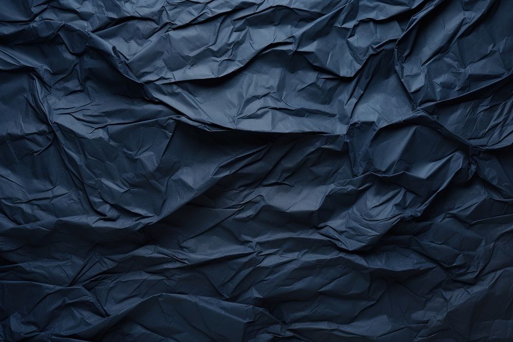 Crumpled paper texture dark blue backgrounds crumpled black.
