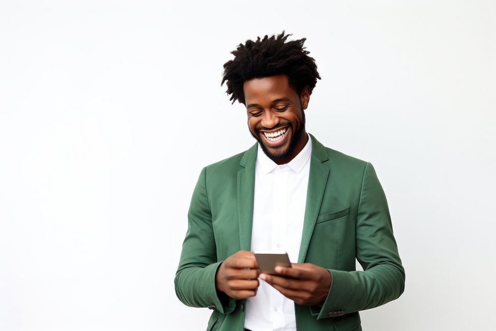 Cheerful black man using phone adult smile white background.