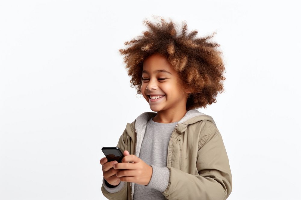 Cheerful kid using phone smile photo white background.