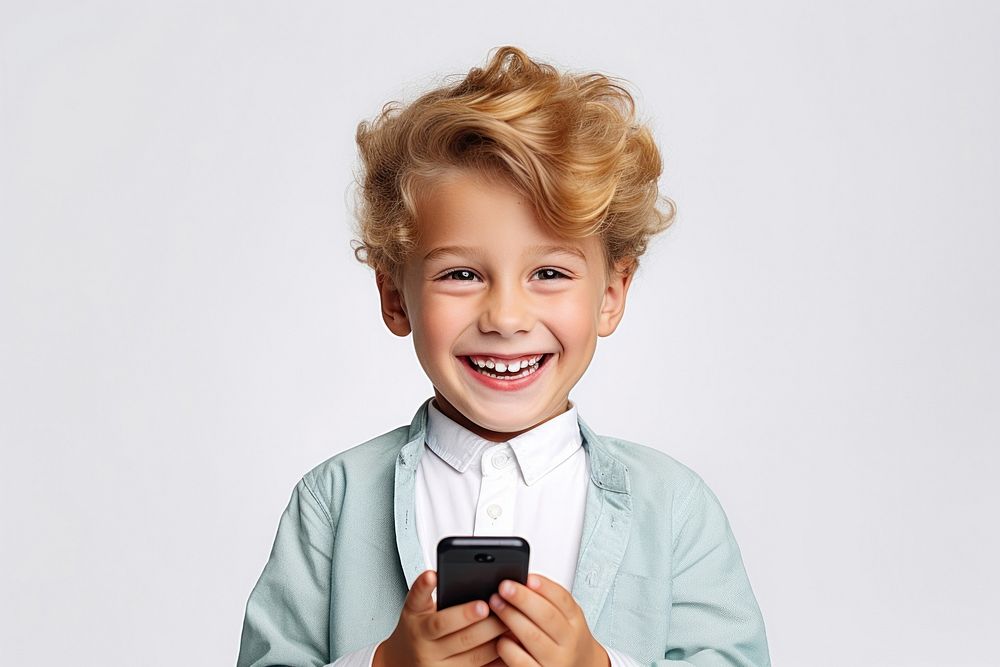Cheerful kid using phone laughing portrait smile.