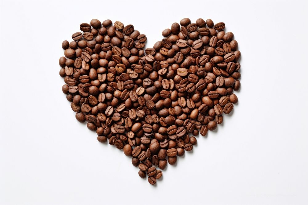 Coffee beans in heart shape white background cappuccino freshness.