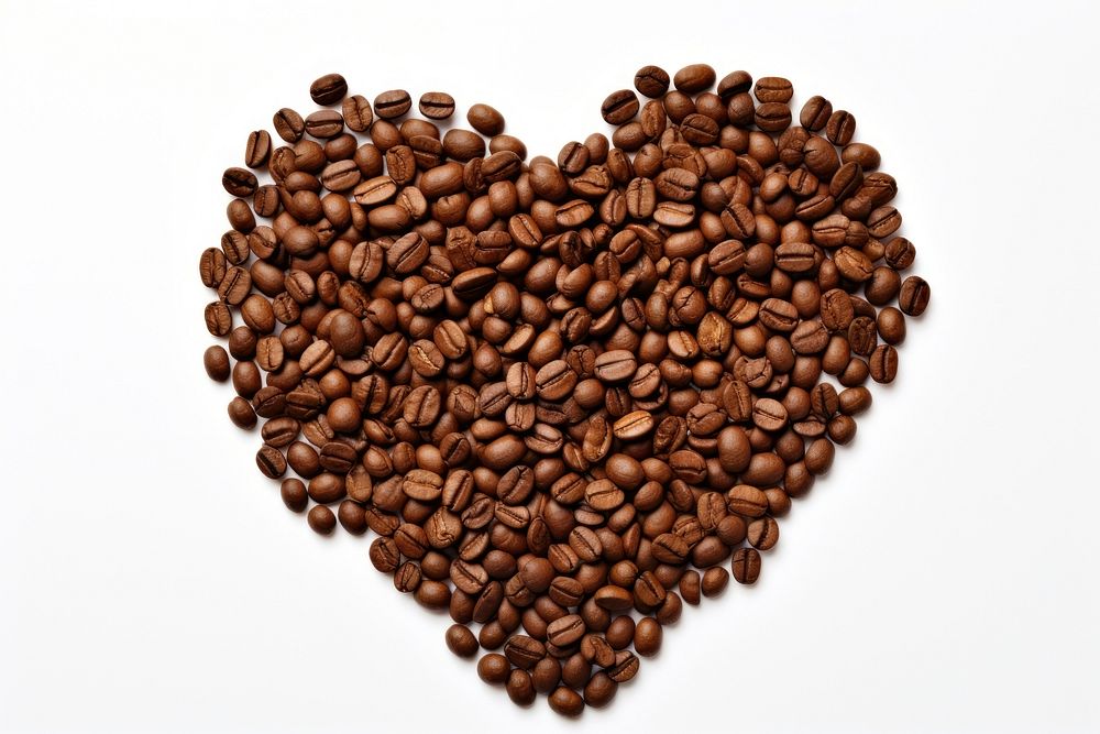 Coffee beans in heart shape backgrounds white background freshness.
