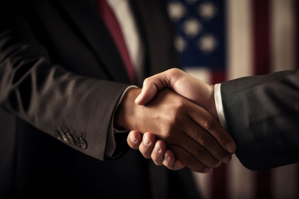 American Business men hand holding handshake adult patriotism.