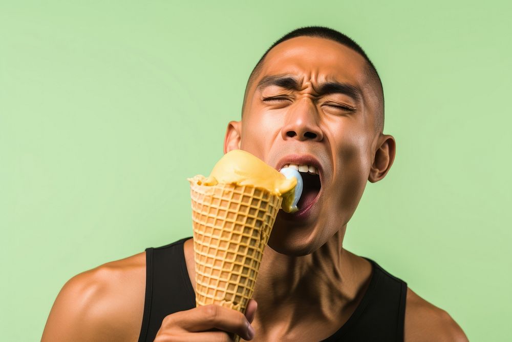 Vietnamese man eating adult cream.
