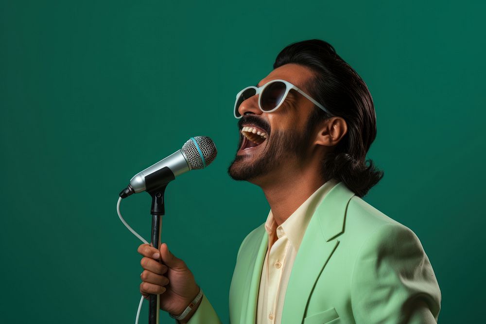 Pakistani man microphone glasses adult.