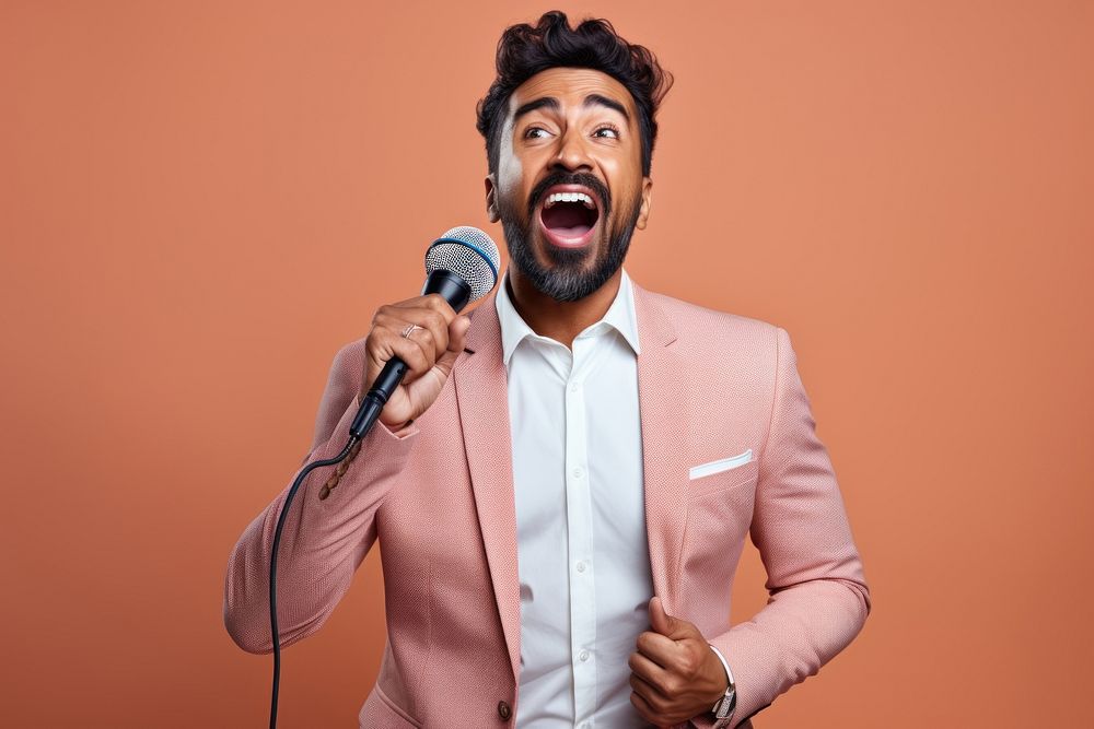 Pakistani man microphone adult performance.