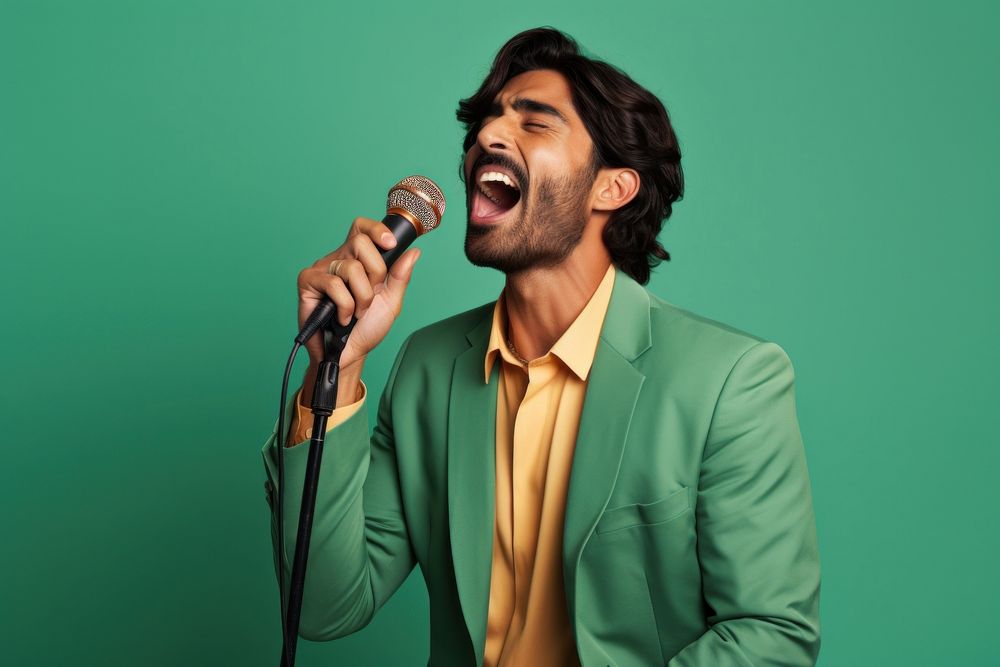 Pakistani man microphone laughing adult.