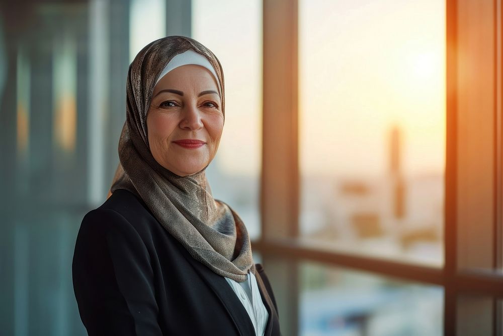 Business photo of middle east old woman smile scarf city.
