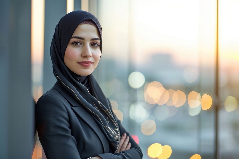 Business photo of arab woman scarf city contemplation.