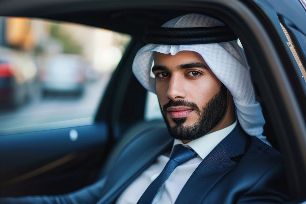 Arab business man on a car portrait vehicle looking.