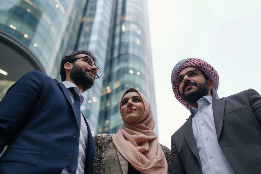 Three middle eastern business people adult scarf togetherness.