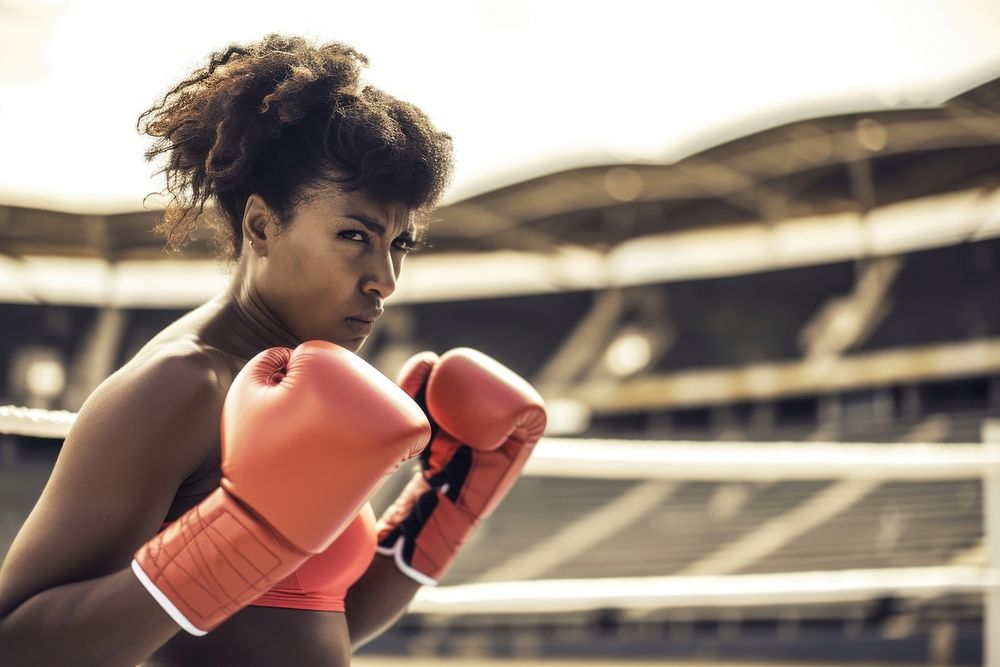African American woman boxing punching sports.