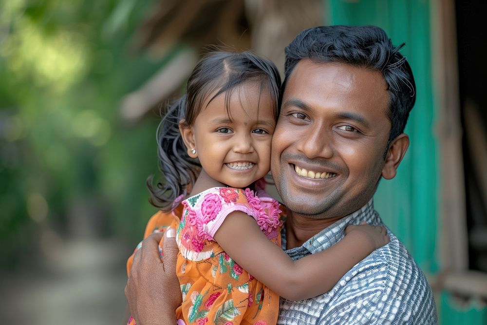 Bangladeshi dad carry daughter child smile happiness.