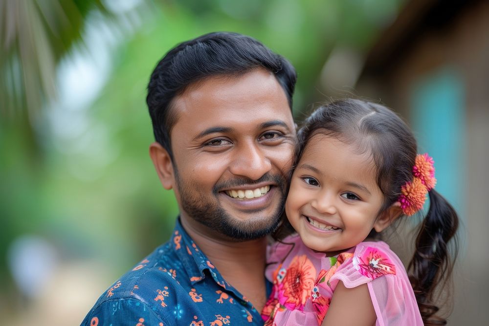 Bangladeshi dad carry daughter child smile happiness.