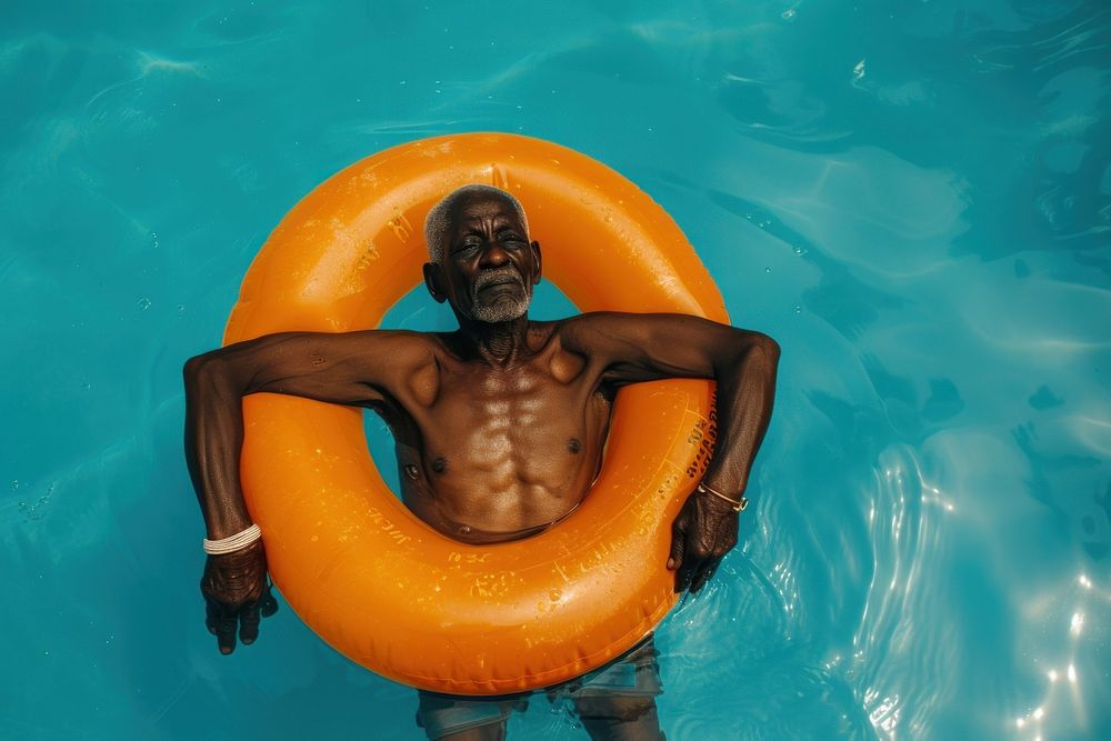 Ghanan man swimming portrait bathing.