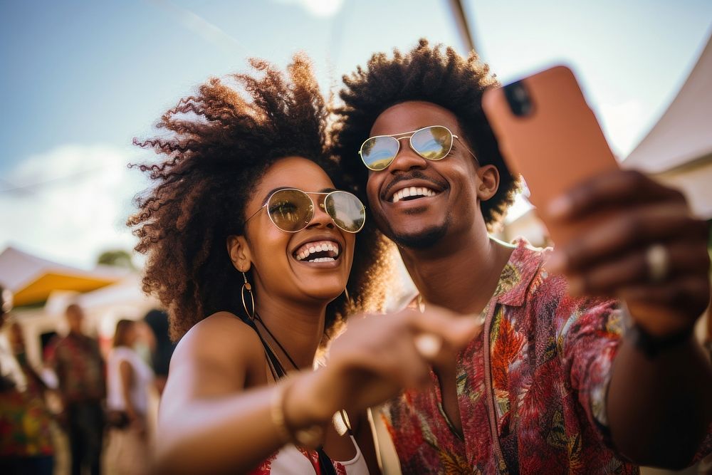 South african couple selfie festival laughing.