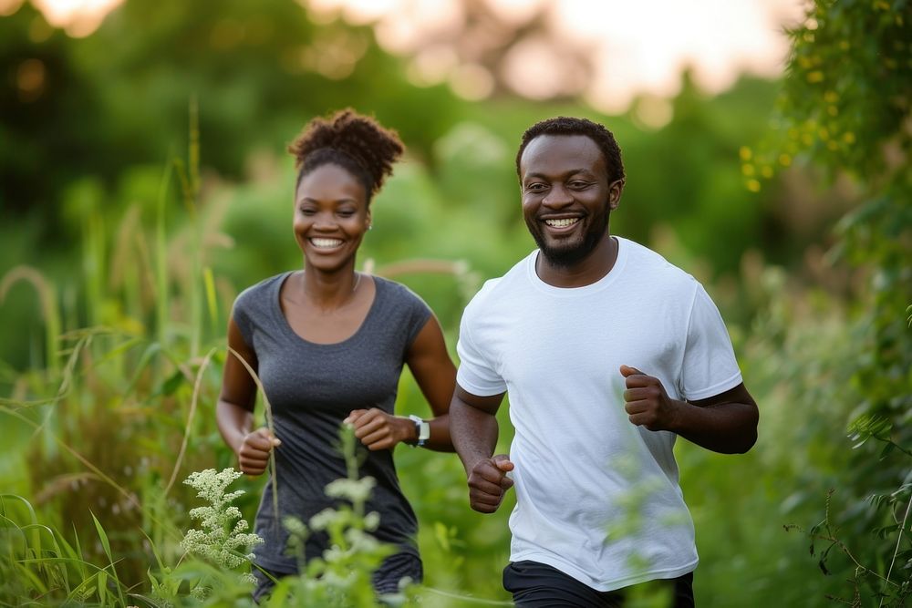 Nigerian husband and wife running jogging cheerful.