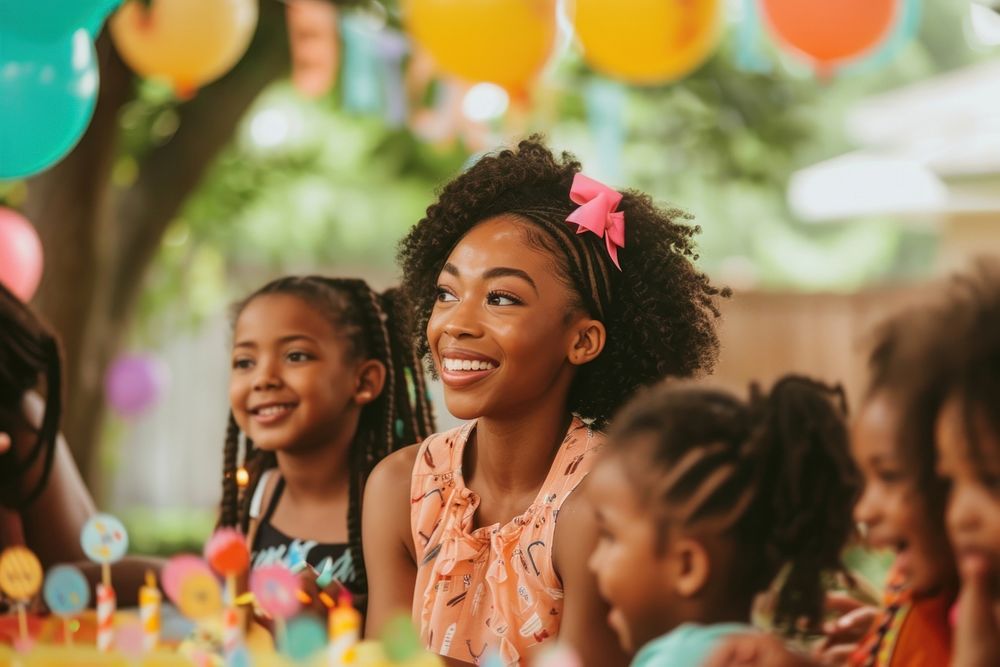 Children black woman at birthday party looking fun togetherness.