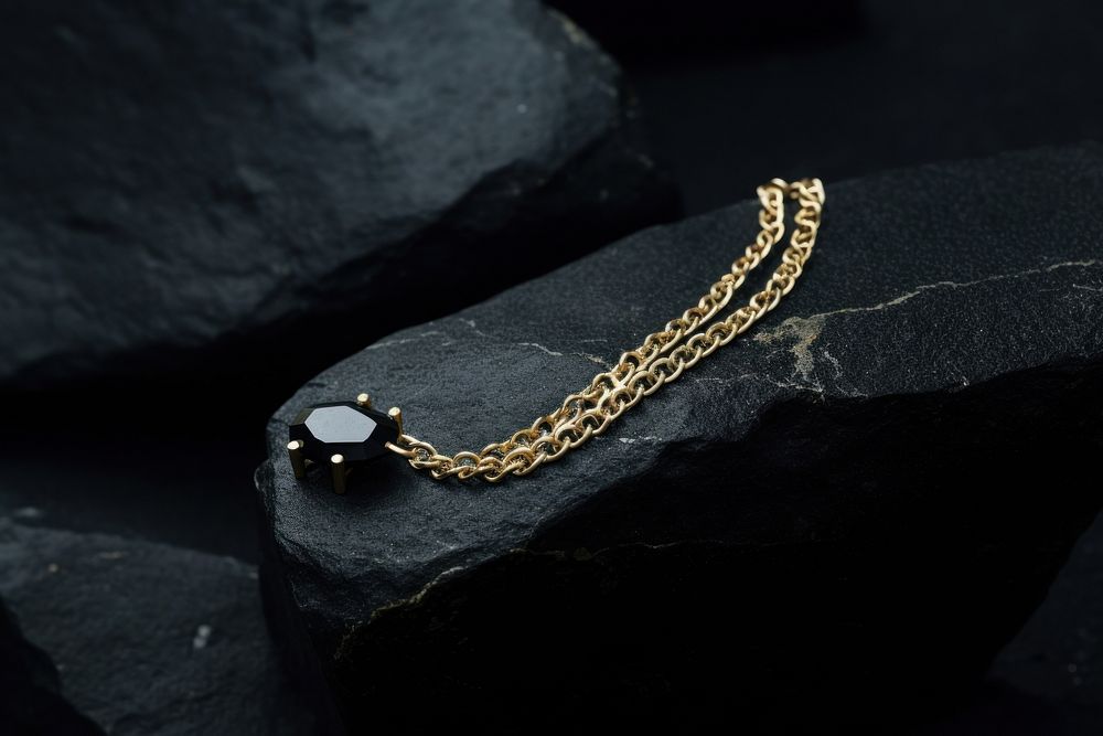 Gold chain necklace gemstone jewelry. AI generated Image by rawpixel.