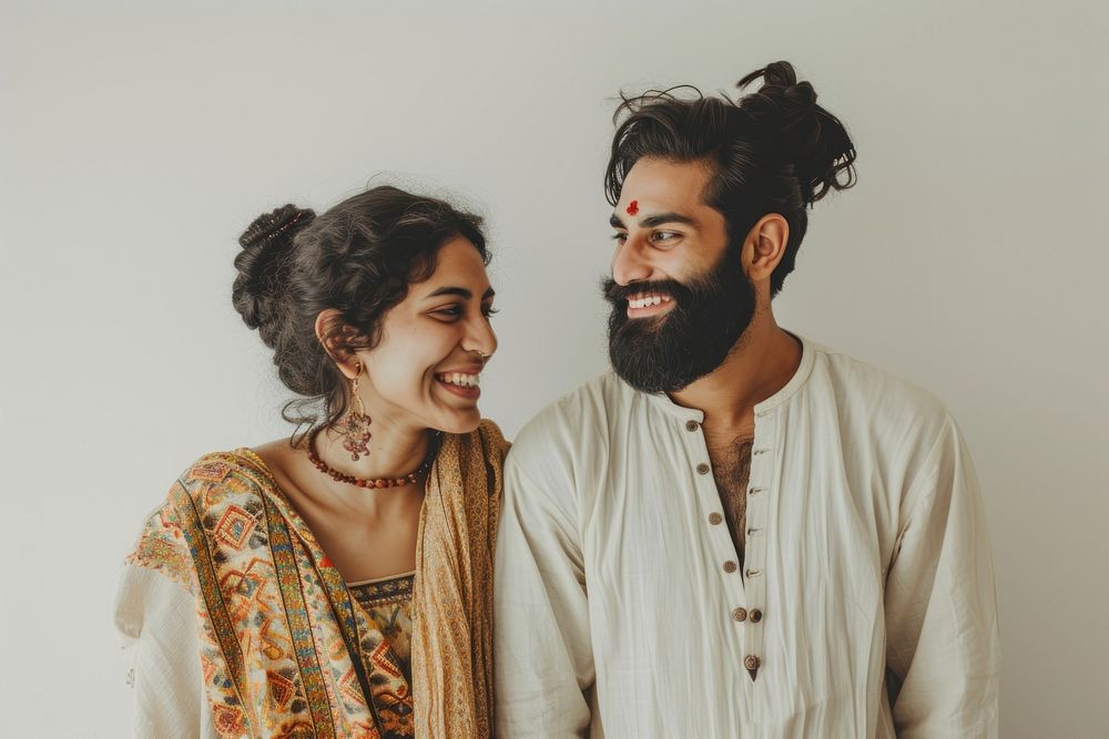 Indian couple cheerful necklace portrait.