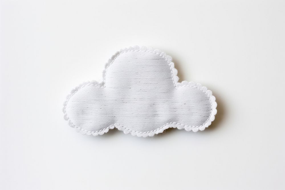 Cloud icon in embroidery style white cloud textured.