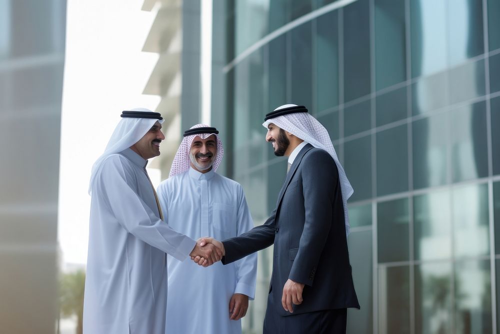 Photo of three arab business people meeting building adult hand.