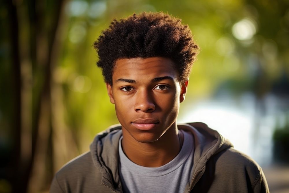 Black man teenager portrait outdoors photo. AI generated Image by rawpixel.