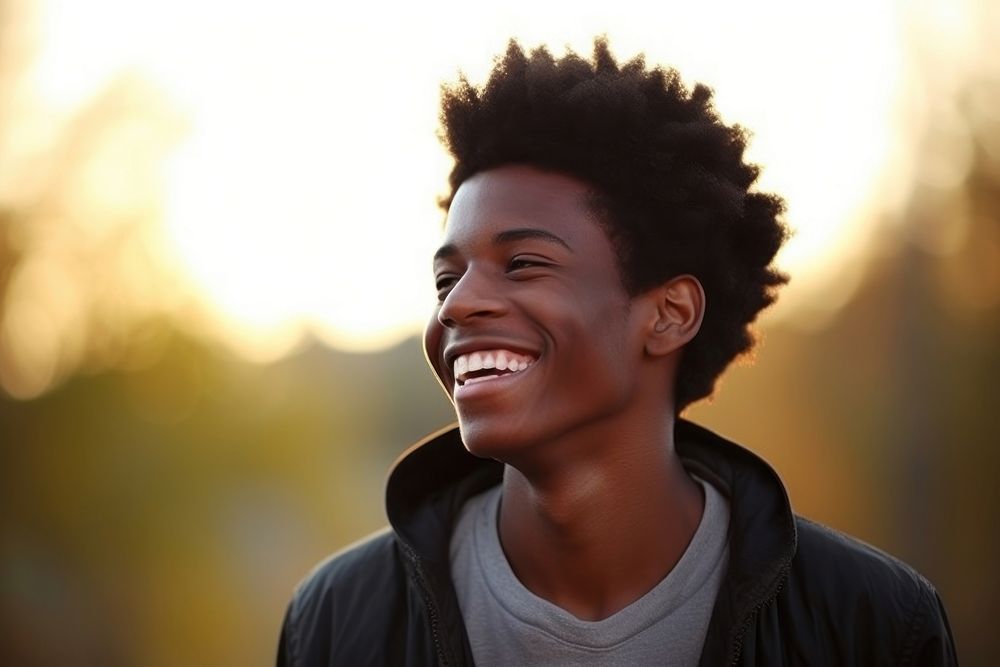 Black man teenager outdoors smile happiness. AI generated Image by rawpixel.