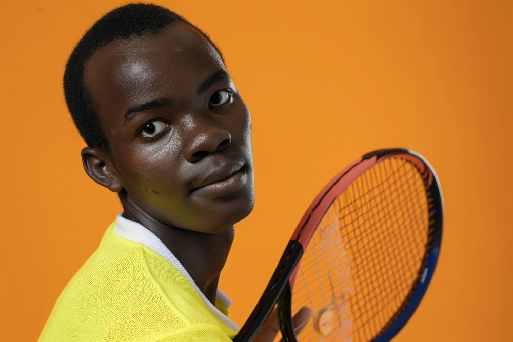 African American tennis player face portrait sports racket.