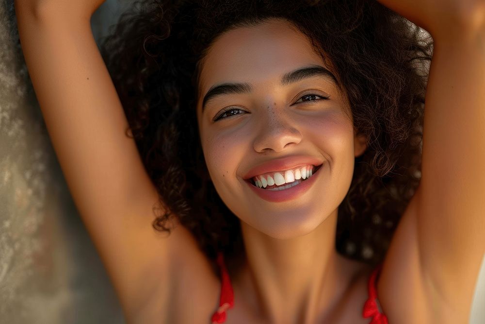 A young latina brazilian woman smile carefree adult.