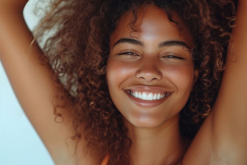 A young latina brazilian woman smile carefree laughing.