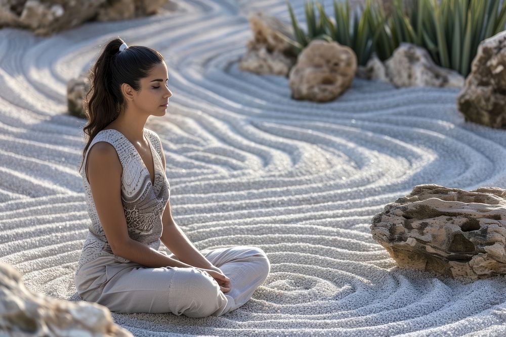 A Latina Brazilian woman in a peaceful state sitting yoga contemplation.