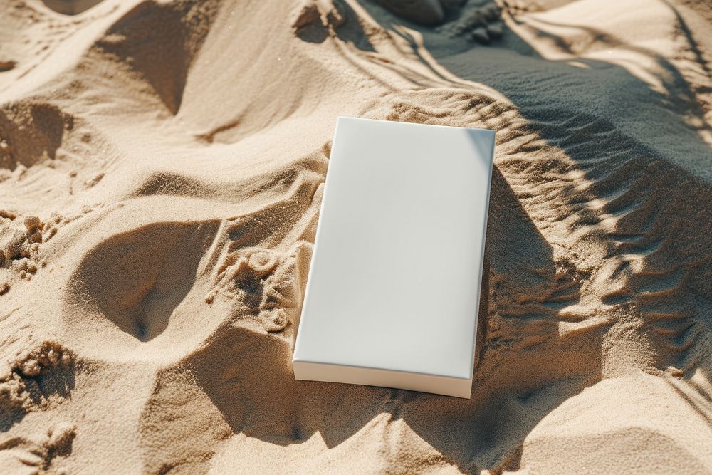 Sunscreen cream packaging  outdoors nature beach.