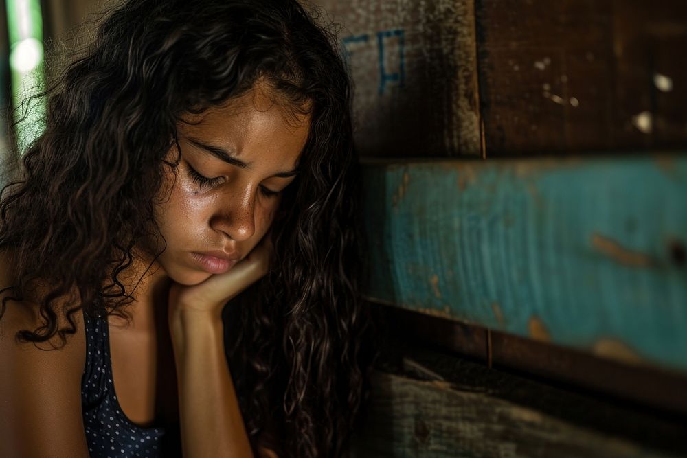 A Latina Brazilian teen feels extremely disappointed at her school disappointment worried skin.