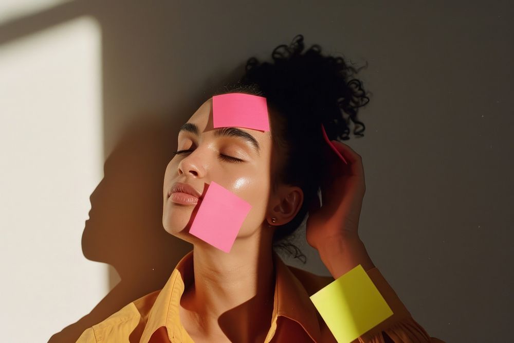 Sticky notes studio shot relaxation hairstyle.