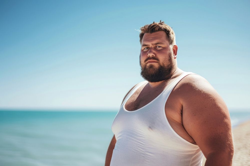 Fat man wearing white tank top summer adult beach.