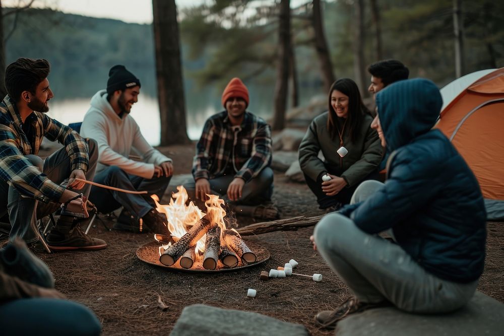 Latino group outdoors camping bonfire.