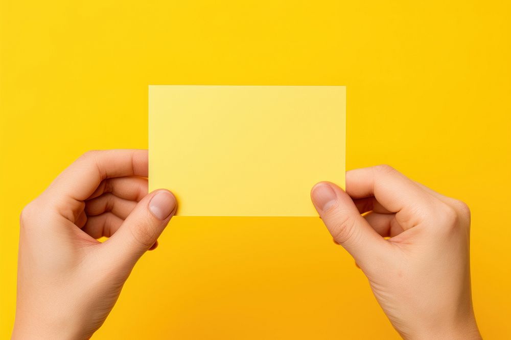 Sticky note holding yellow paper. AI generated Image by rawpixel.