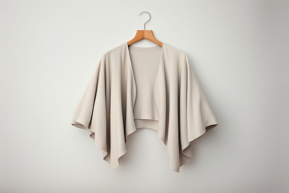 Shrug fashion blouse coathanger. AI generated Image by rawpixel.
