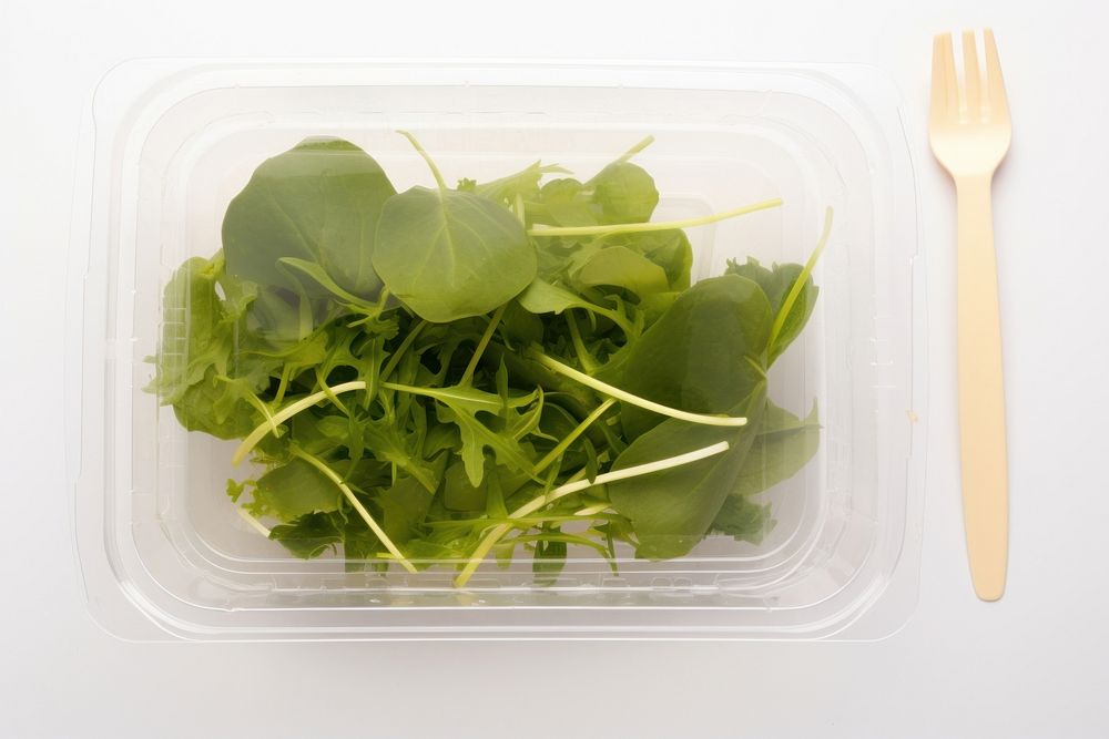 Salad packaging  vegetable arugula plant.