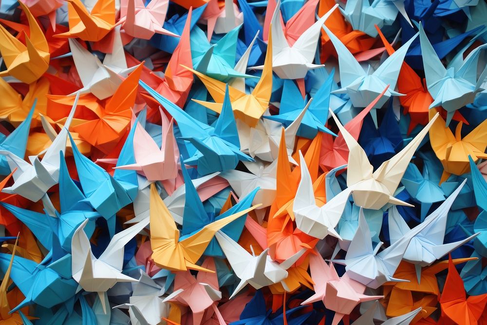 Bird origami paper cranes backgrounds art arrangement.
