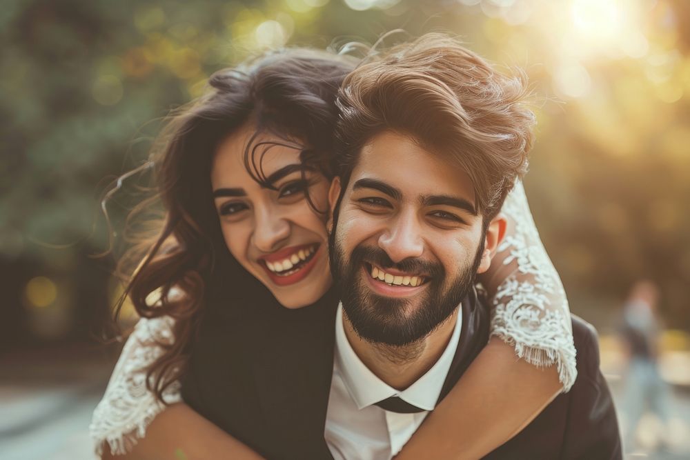Indian young couple hugging laughing wedding adult.