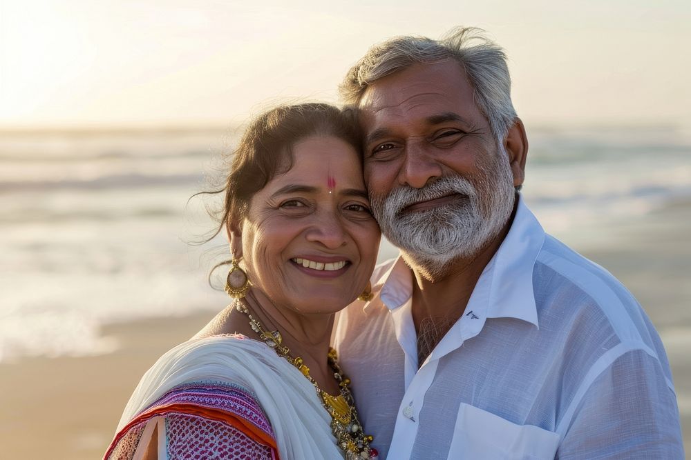Indian senior couple Happy beach portrait outdoors.