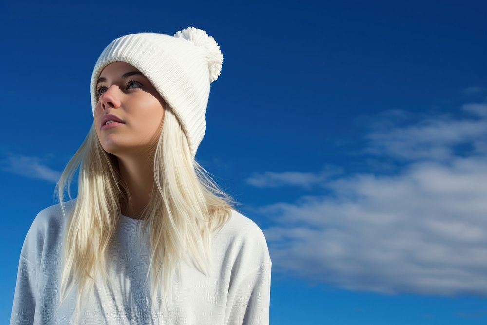White beanie hat adult blue sky.