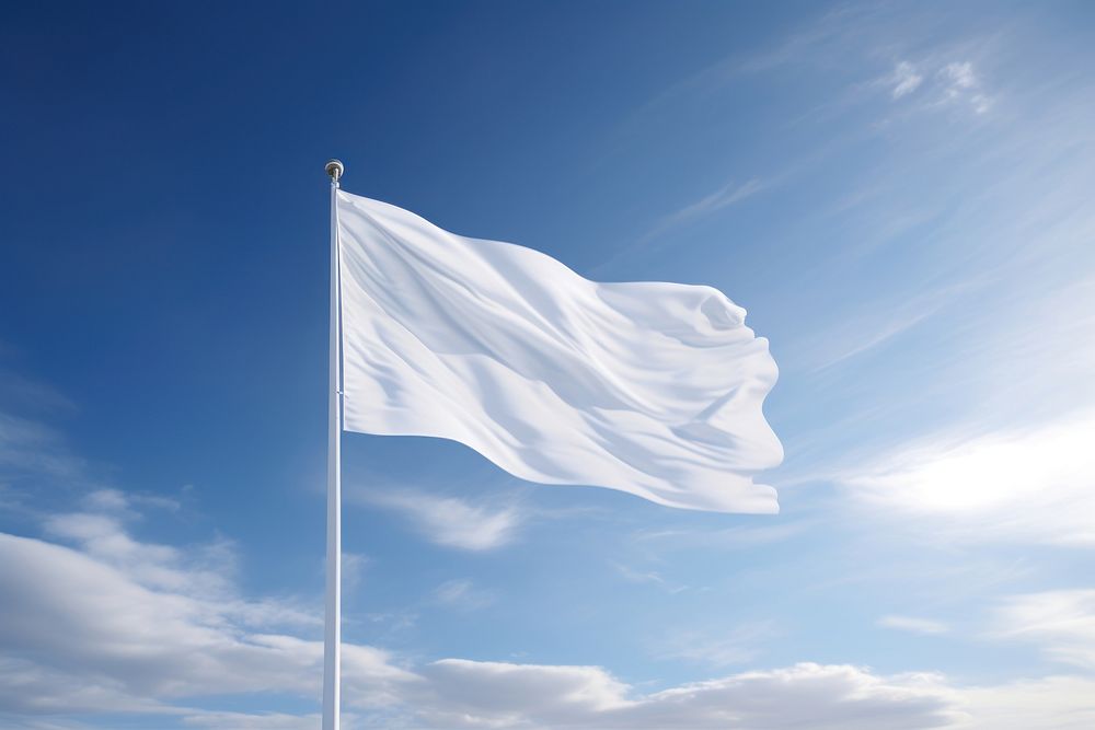 White long vertical flag banner blue sky patriotism.