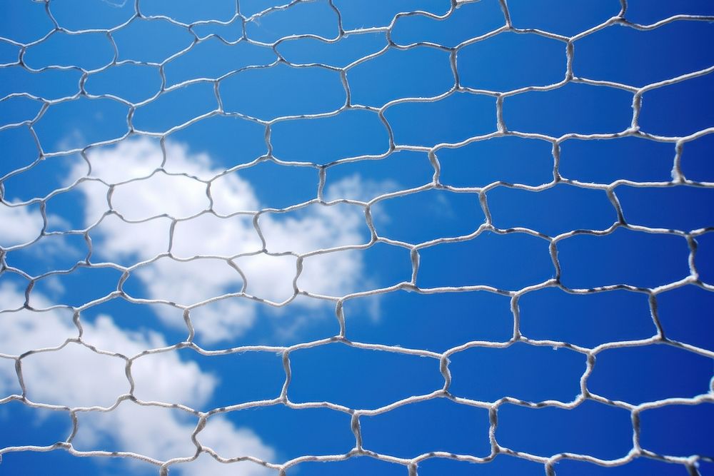 White poster wire mesh sky outdoors blue backgrounds.