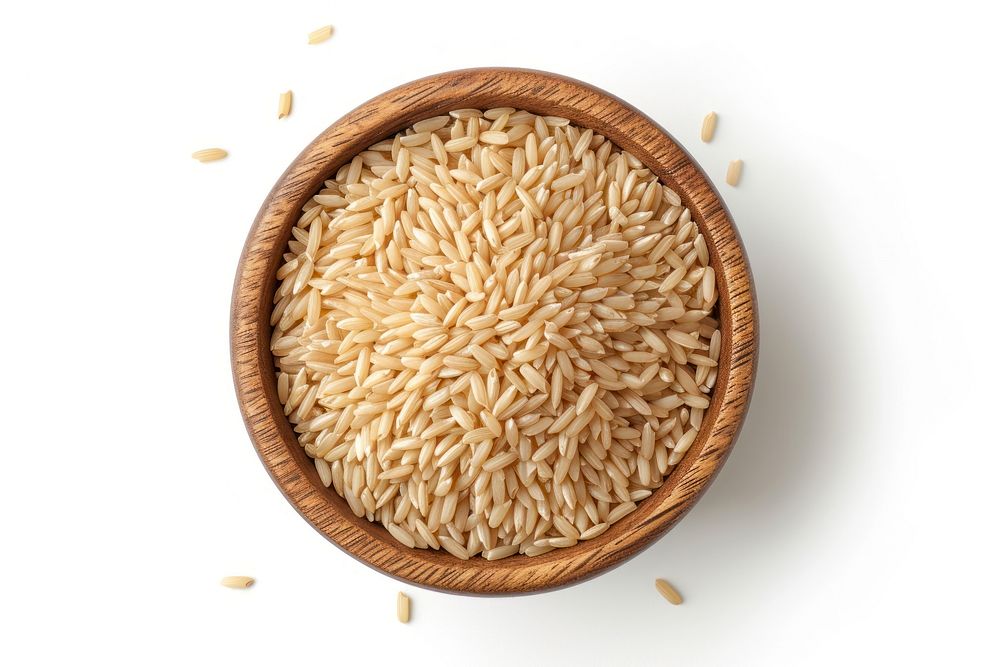 Brown rice groats in a wooden bowl food white background ingredient.