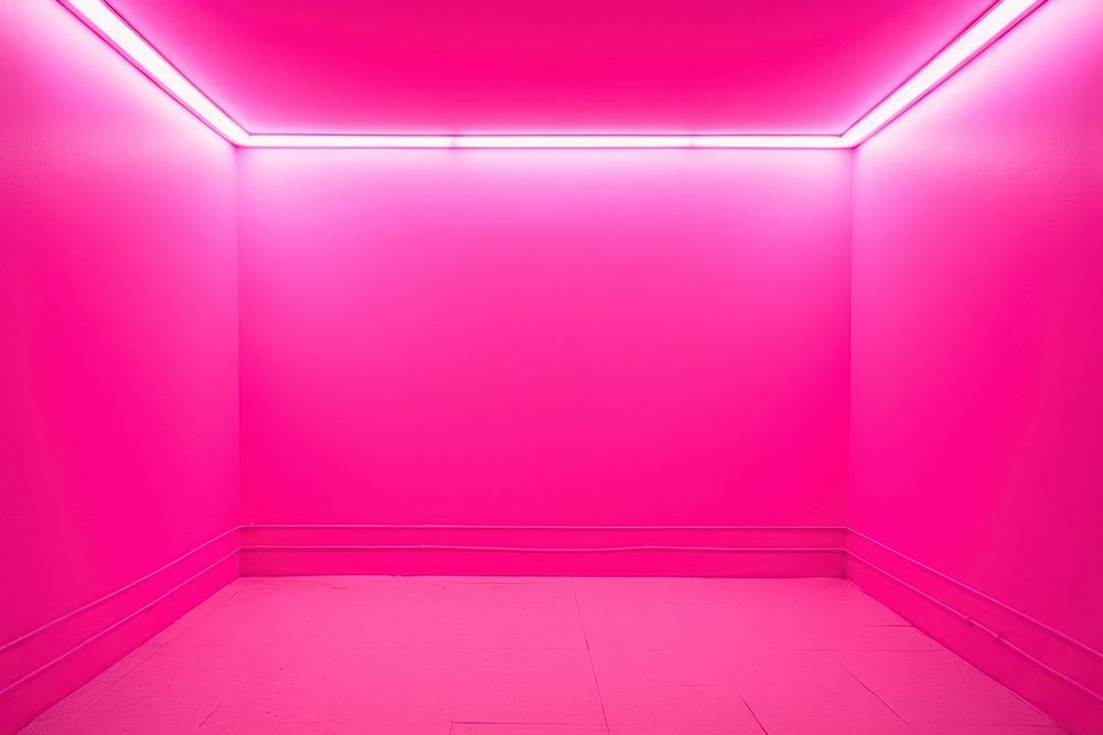 Bright neon pink wall empty room architecture illuminated darkness.